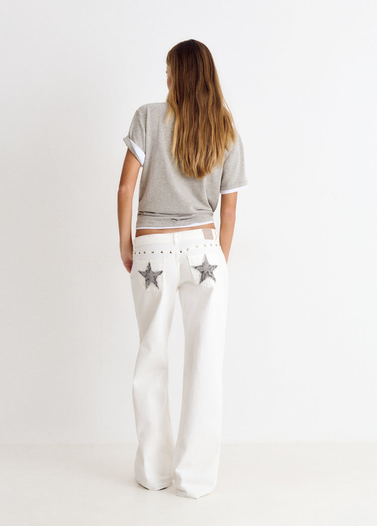 Pantalón tiro bajo estrellas glitter y tachas