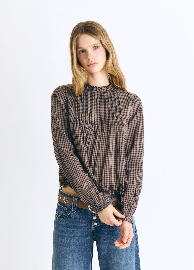 Bluse mit Karomuster und besticktem Saum