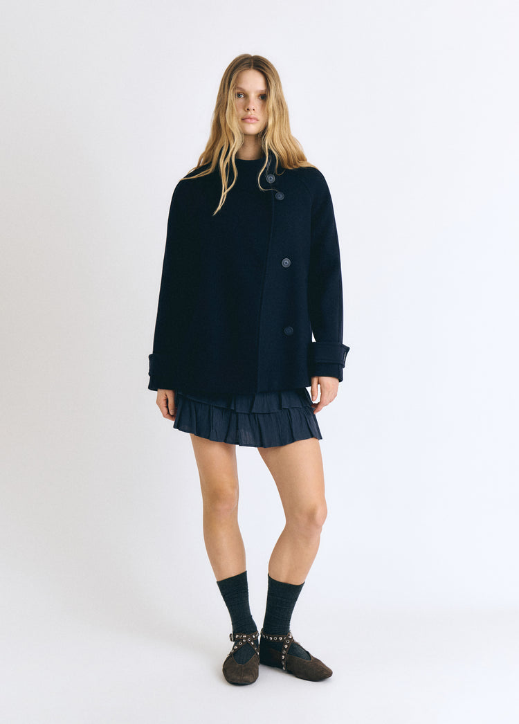 Manteau à col montant avec laine