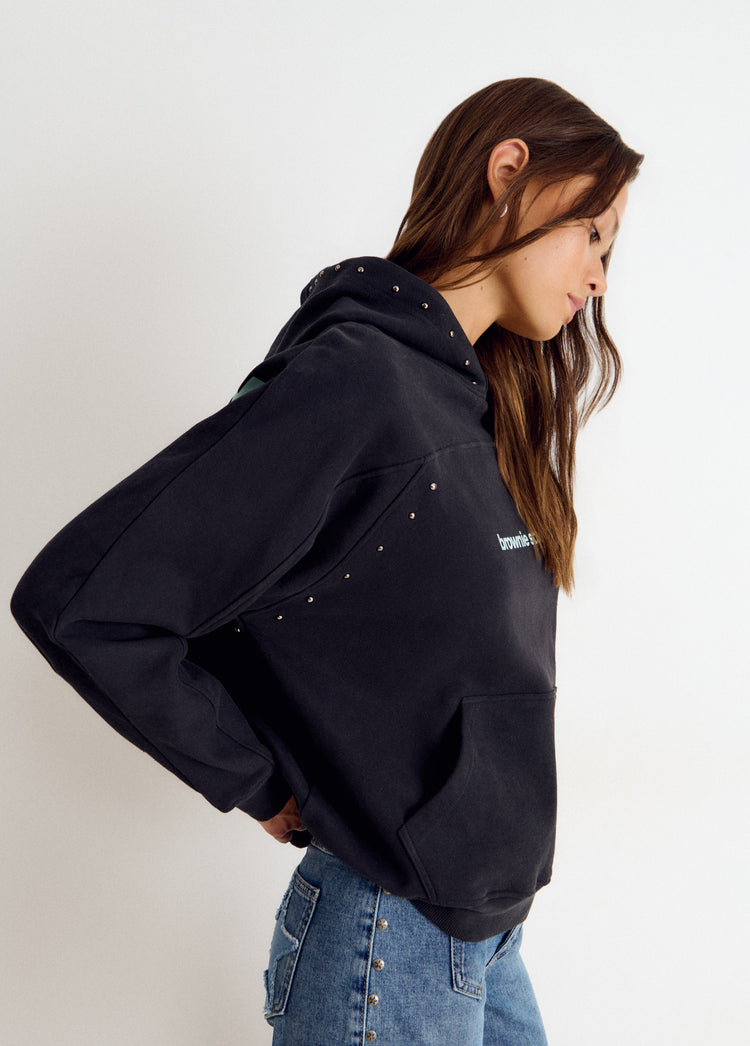 Sudadera capucha tachas