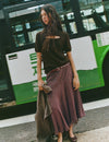 Long plaid skirt with an asymmetric hem