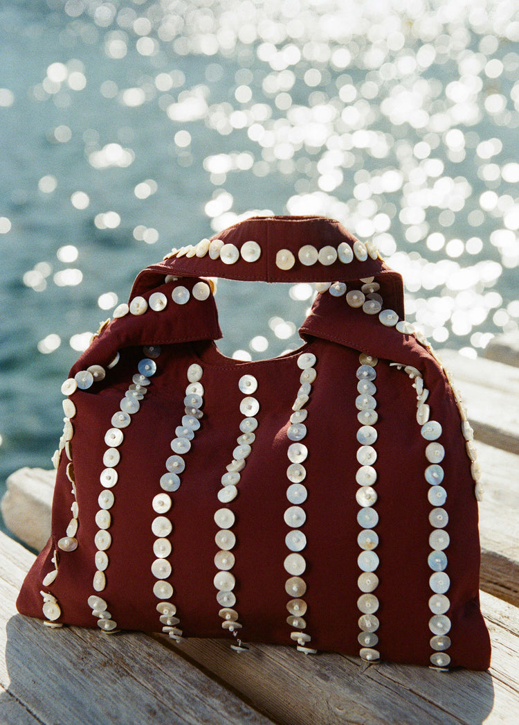 Bolso pequeño mano nácar