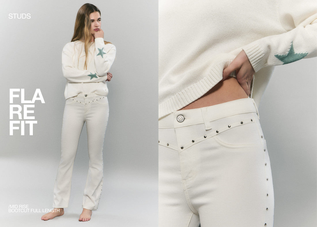 Jeans flare cropped con borchie