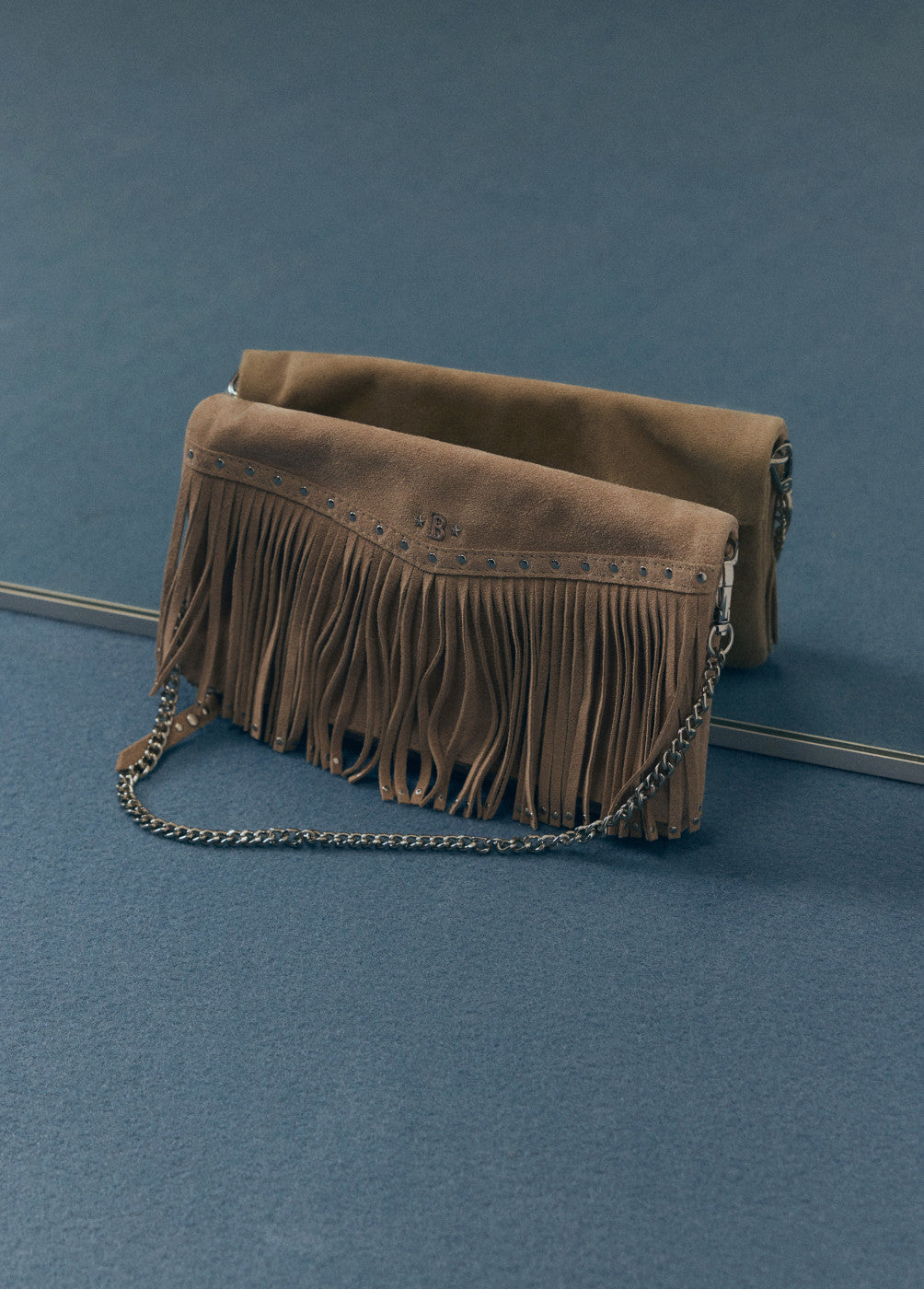 Mala aba franjas pele