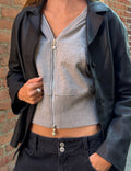 Sudadera capucha tachas