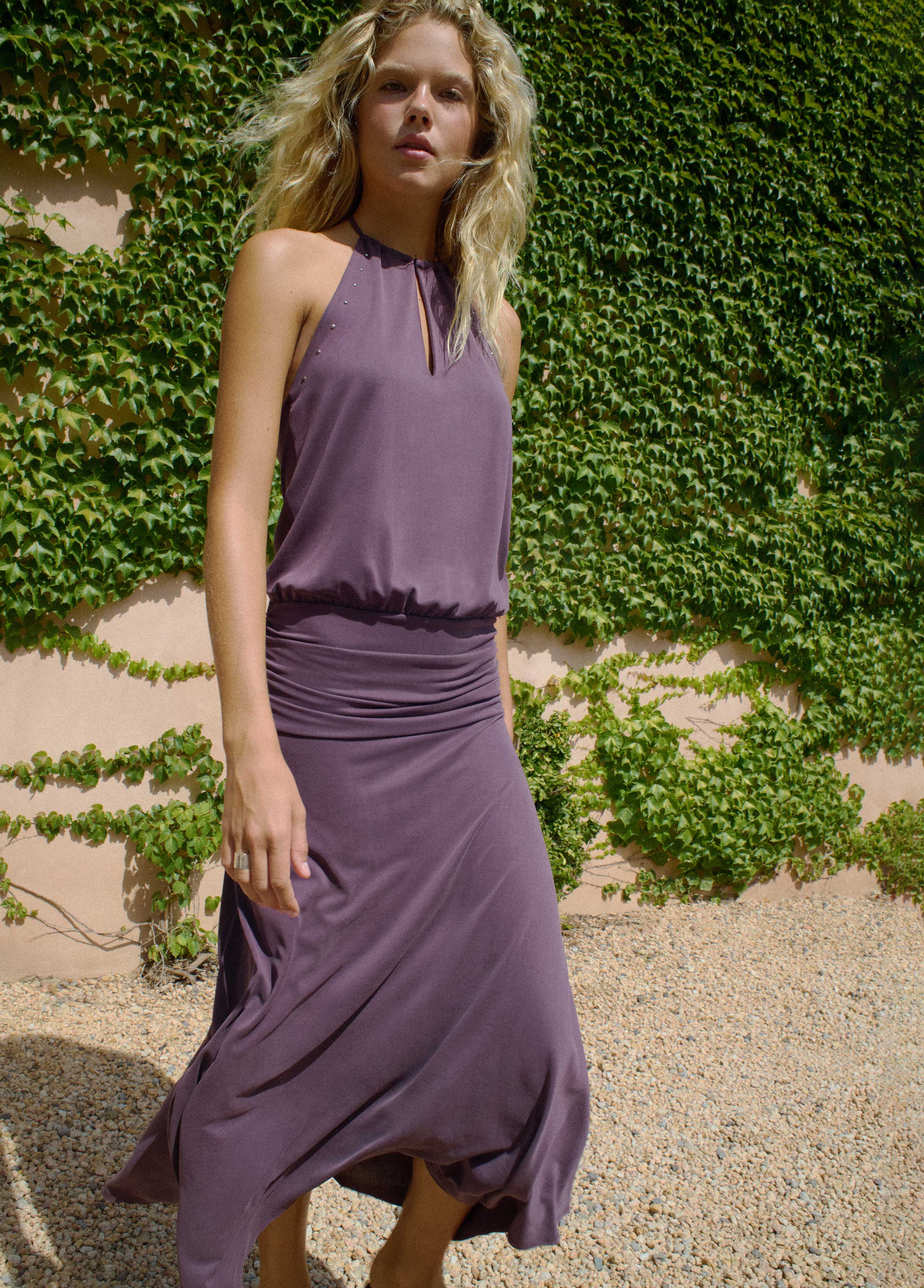 Low-cut studded dress