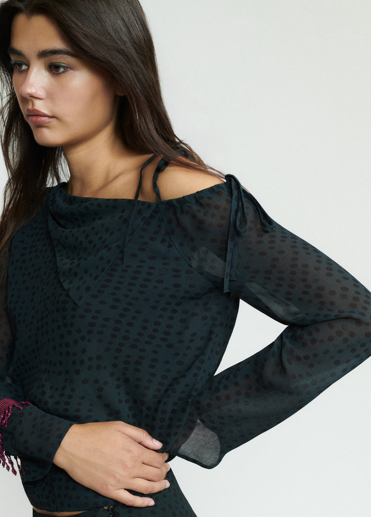 Blusa manga larga asimétrica
