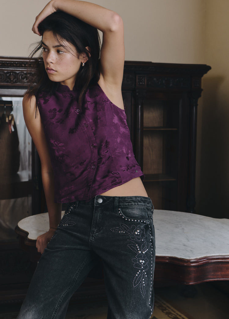 Low-rise jeans with floral studs