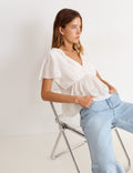 Short sleeve blouse with ruffles