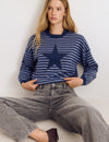 Maglione a righe con stella