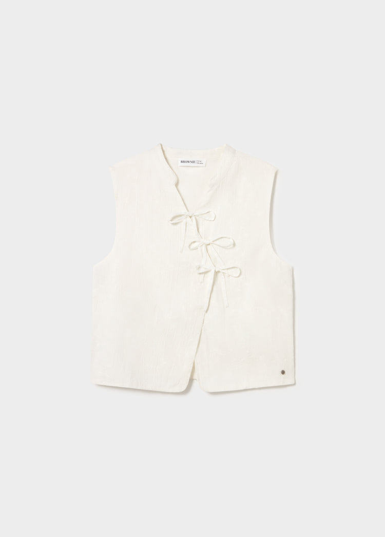 Chaleco bordado nudos