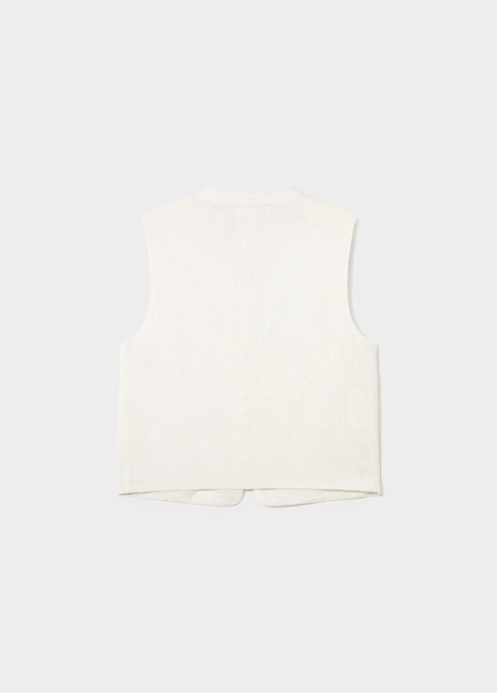 Embroidered knot vest
