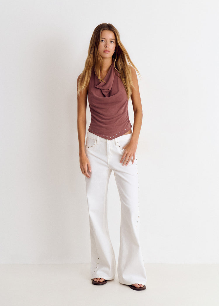 Pantalón pieza lateral tachuelas