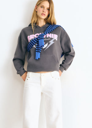 Low-rise pants with glitter stars and studs