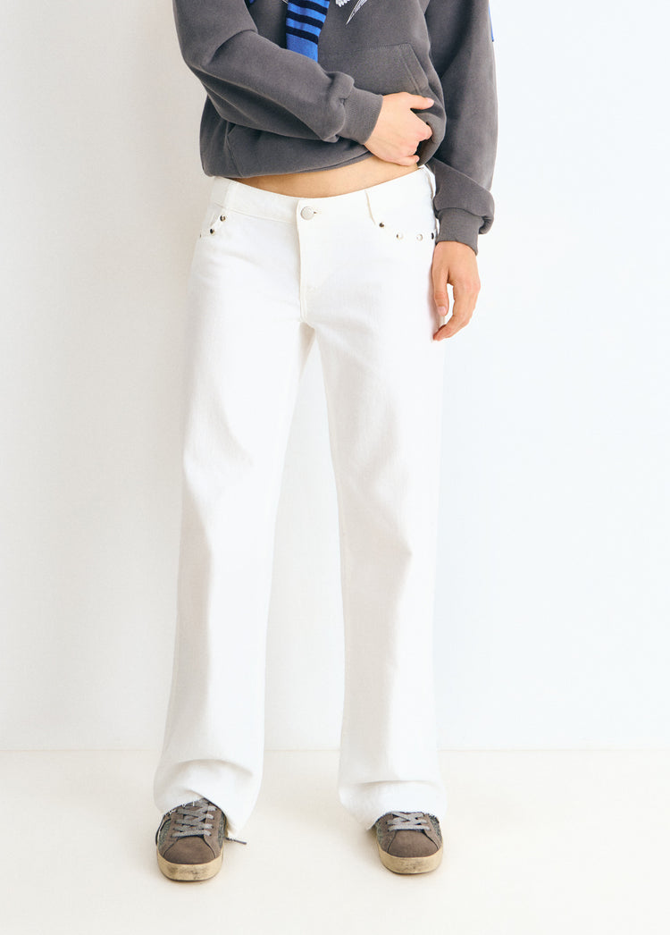 Pantalón tiro bajo estrellas glitter y tachas