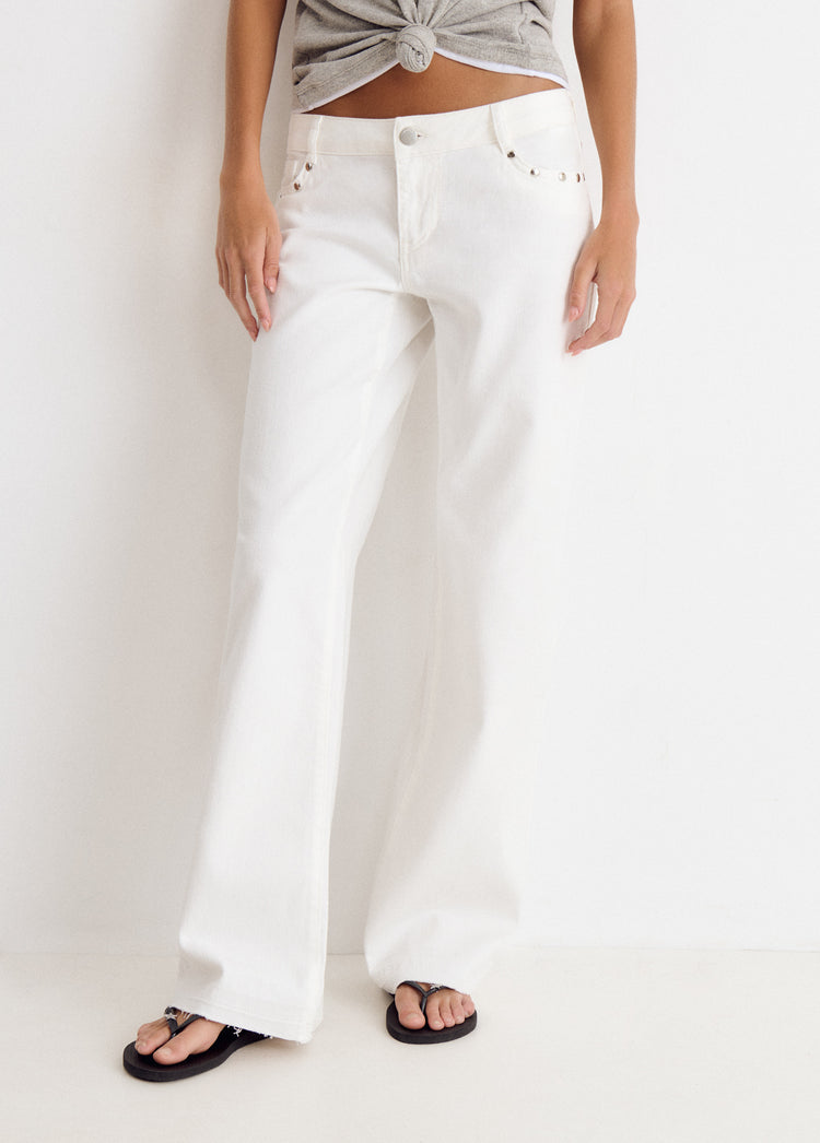 Pantalon tiro bajo estrellas glitter y tachas