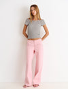 Pantalon pieza cintura con tachas