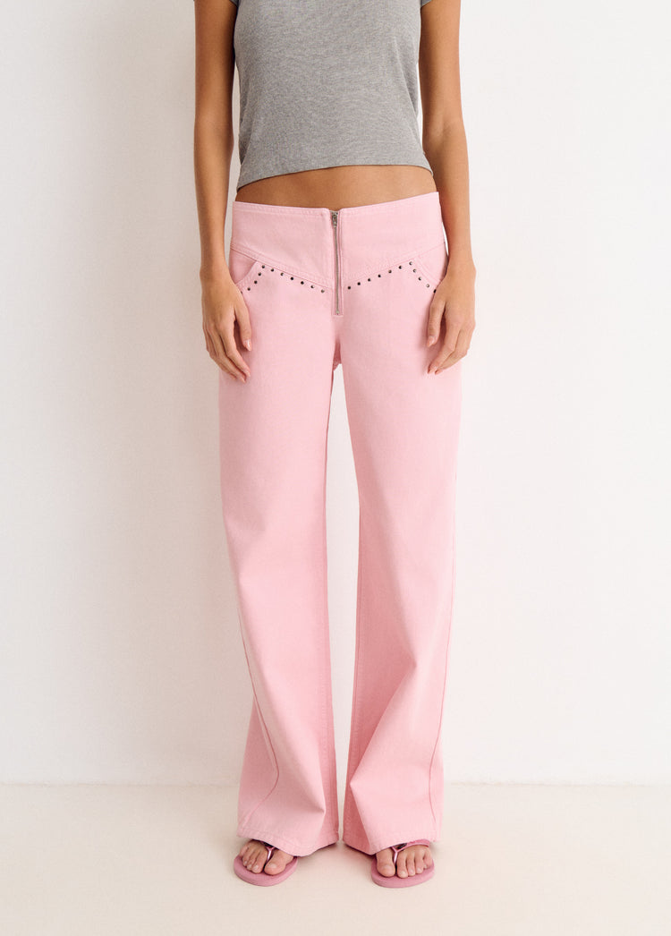Pantalón pieza cintura con tachas