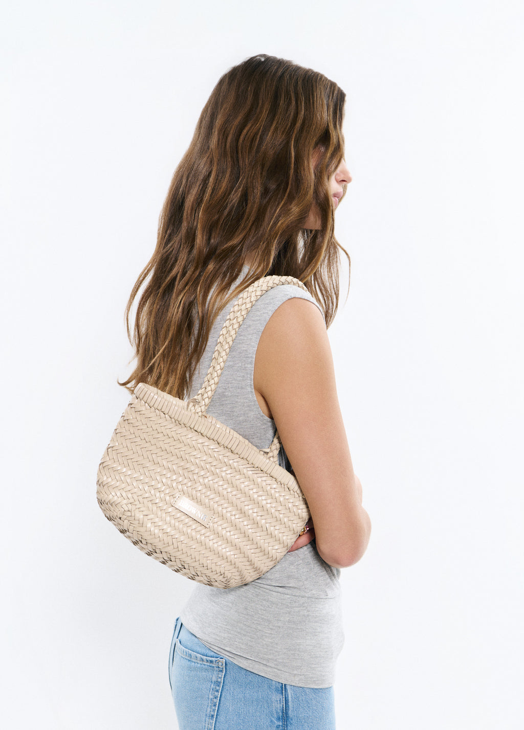 Mala shopper pequena trançada em pele