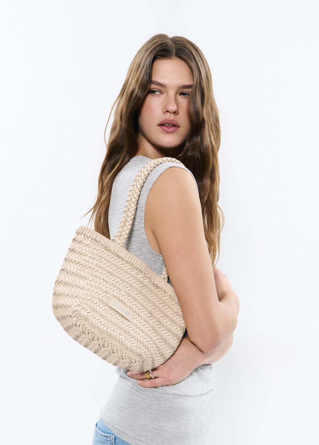 Mala shopper pequena trançada em pele