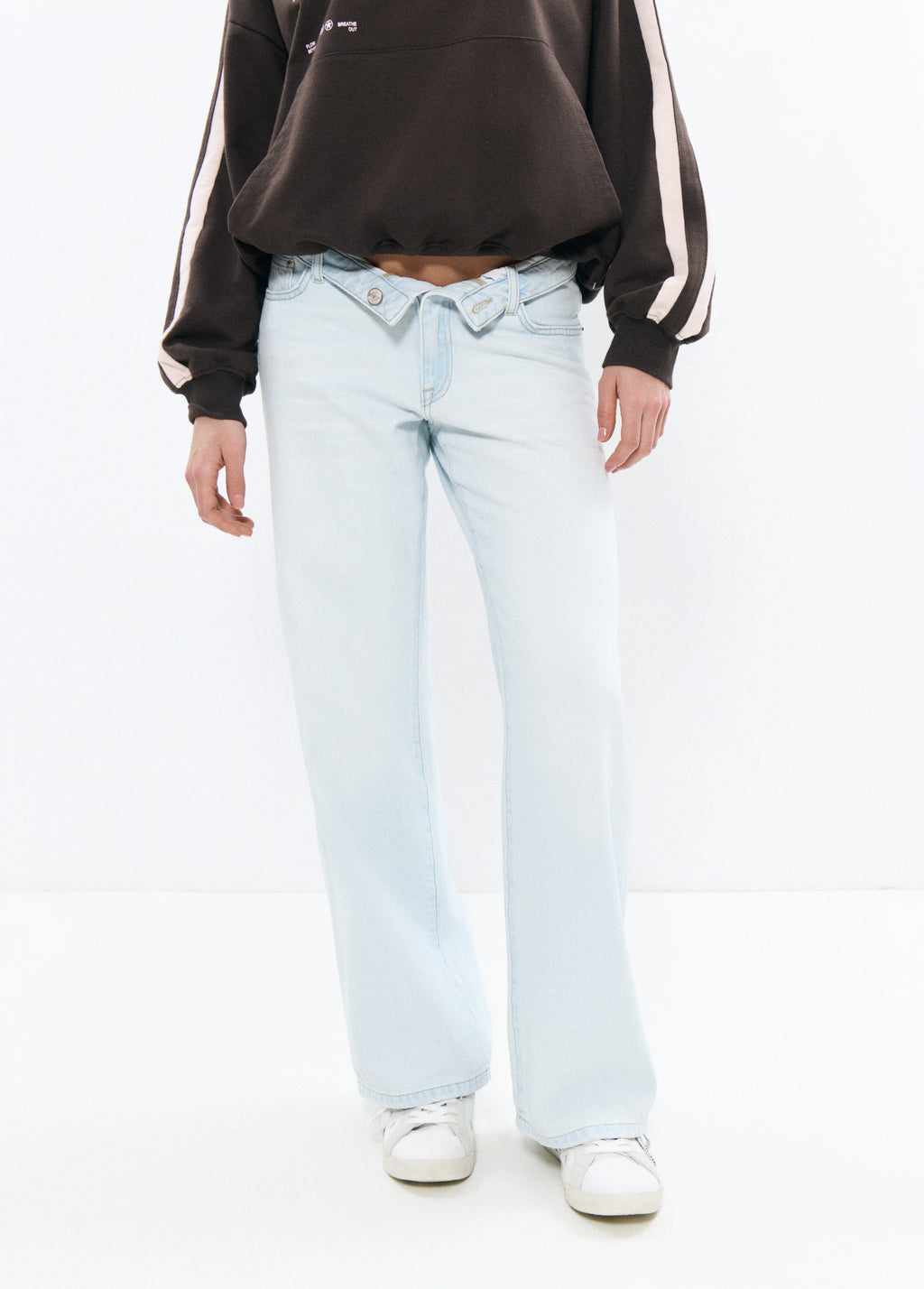 Jeans with turned-up waistband