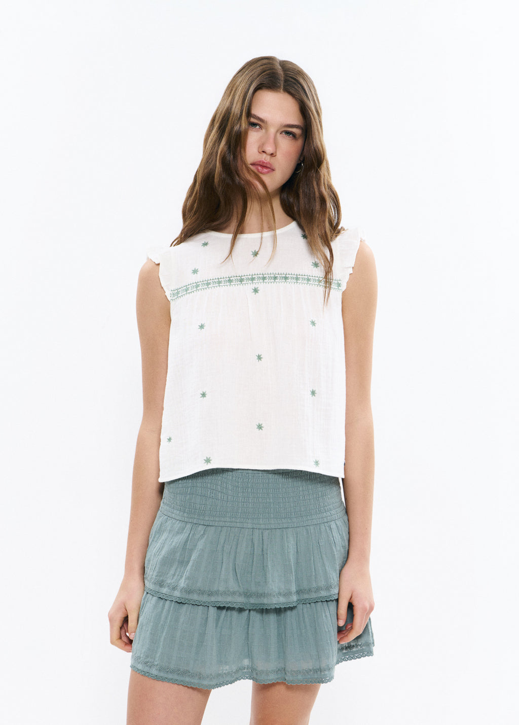Blusa dobetela bordados