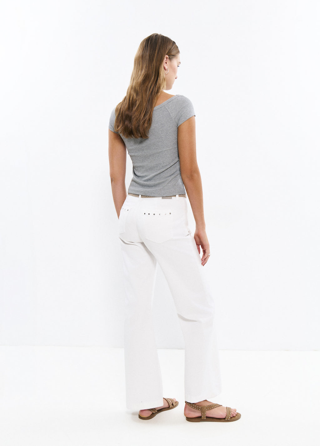 Calças culotes com tachas