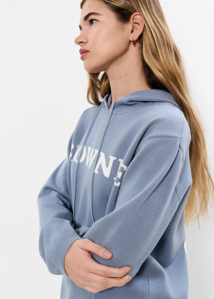 Maglione con cappuccio e stella
