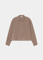 Blusa cropped de cuadros en tono crudo vista de frente