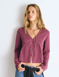 Blusa manga larga tachas