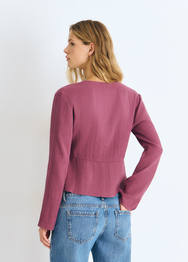 Blouse à manches longues avec clous décoratifs