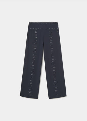 Pantalón largo tachas