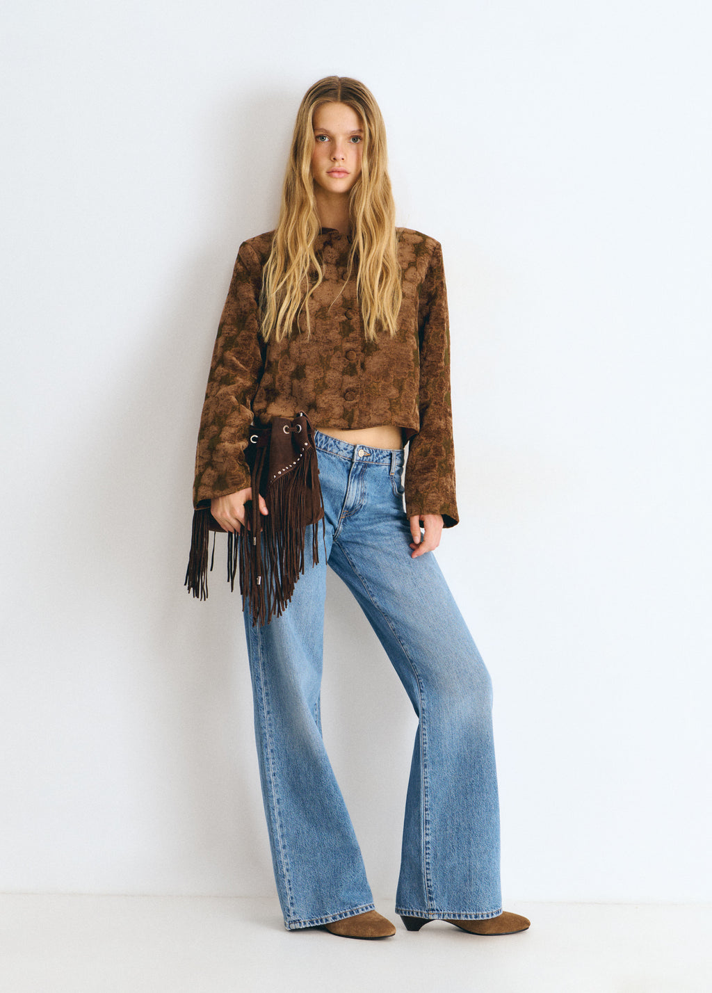 Fringed bucket bag