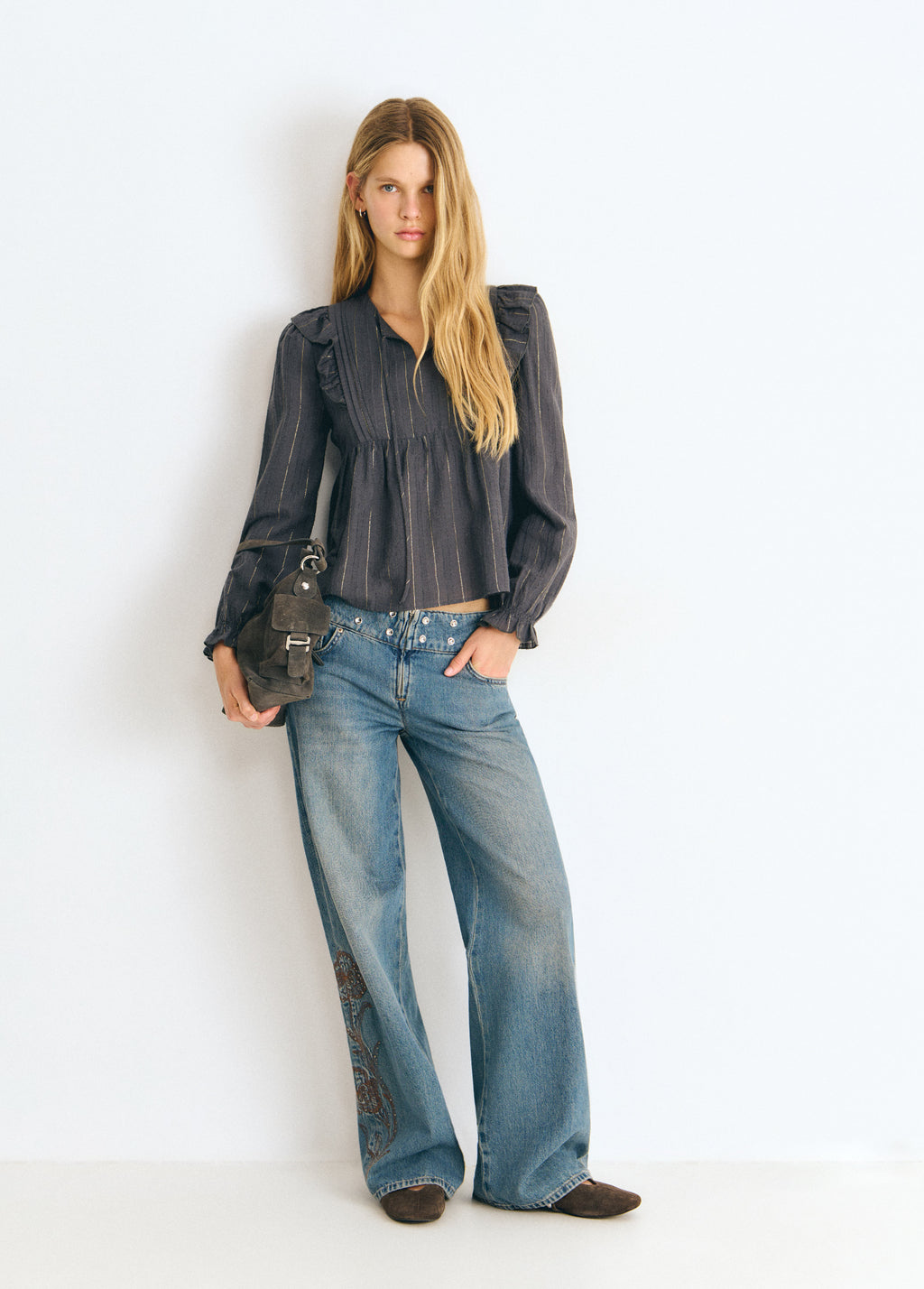 Blouse with ruffle detail and lurex stripe
