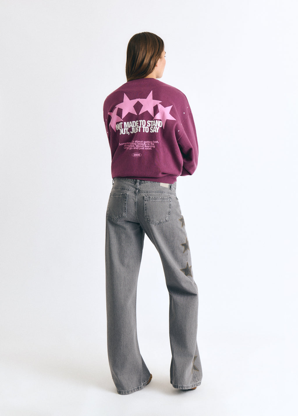 Jeans estrellas tachas lateral