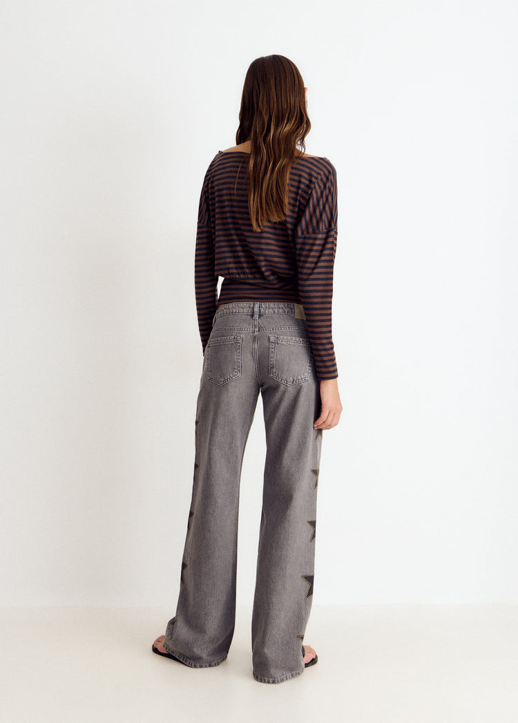Jeans with stars and side studs