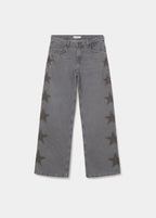 Jeans estrellas tachas lateral