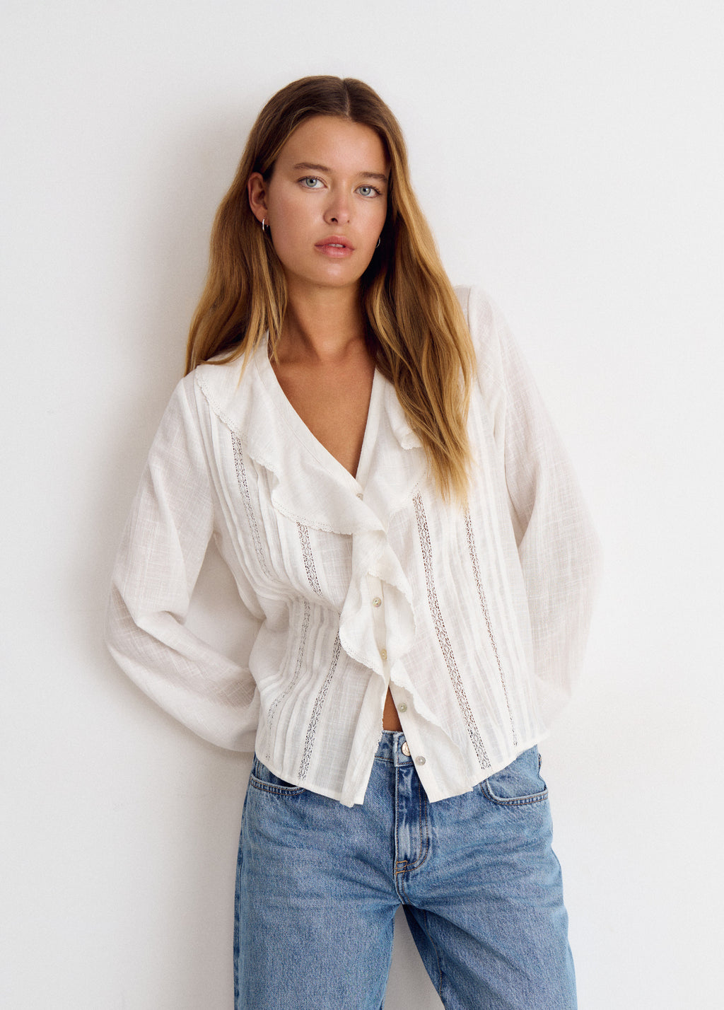Blusa volante lurex