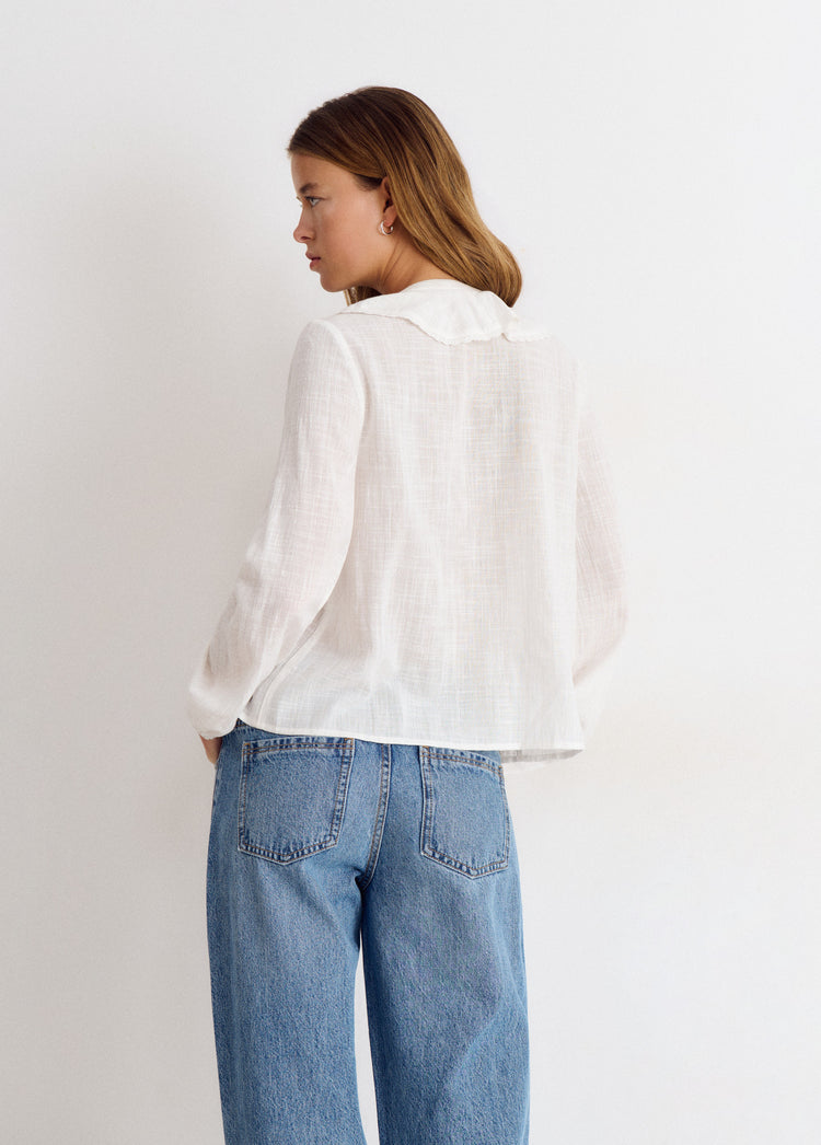Blusa volante lurex