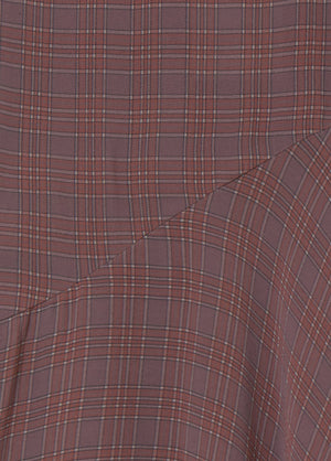 Long plaid skirt with an asymmetric hem