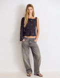 Blusa con revers e borchie