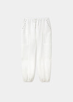 Pantalón bombacho lino detalle tachas