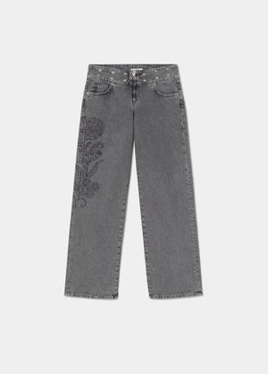 Jeans met studs en borduurwerk in de tailleband