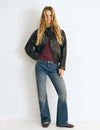 Jeans con borchie e vita alta