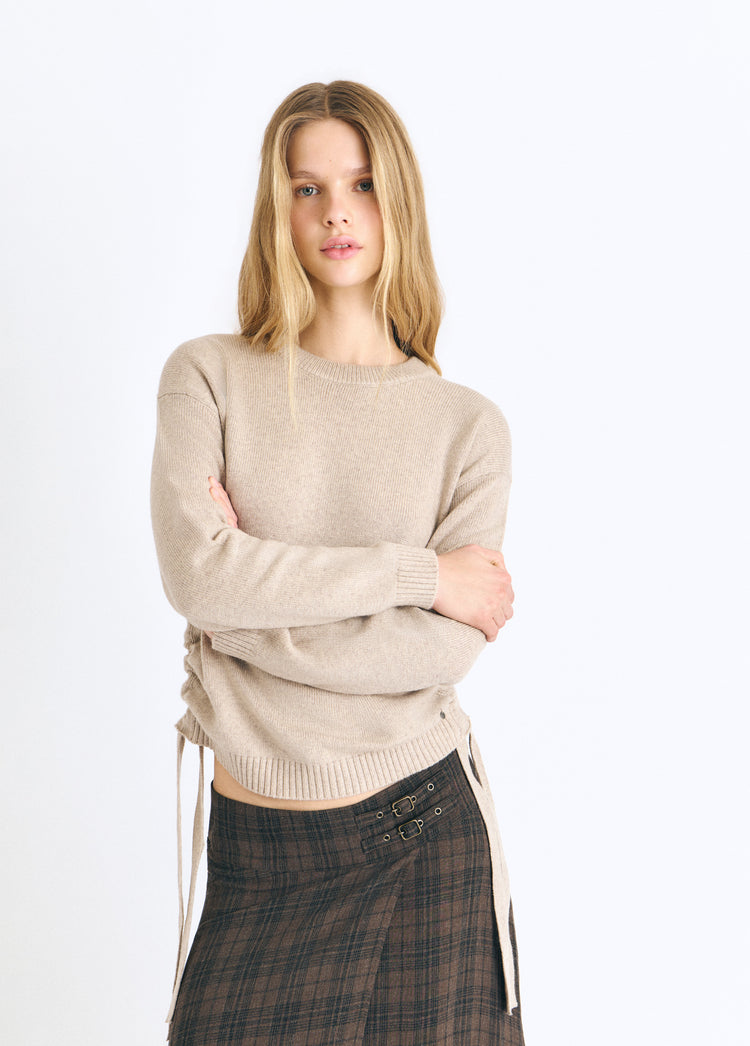 Bow braid sweater