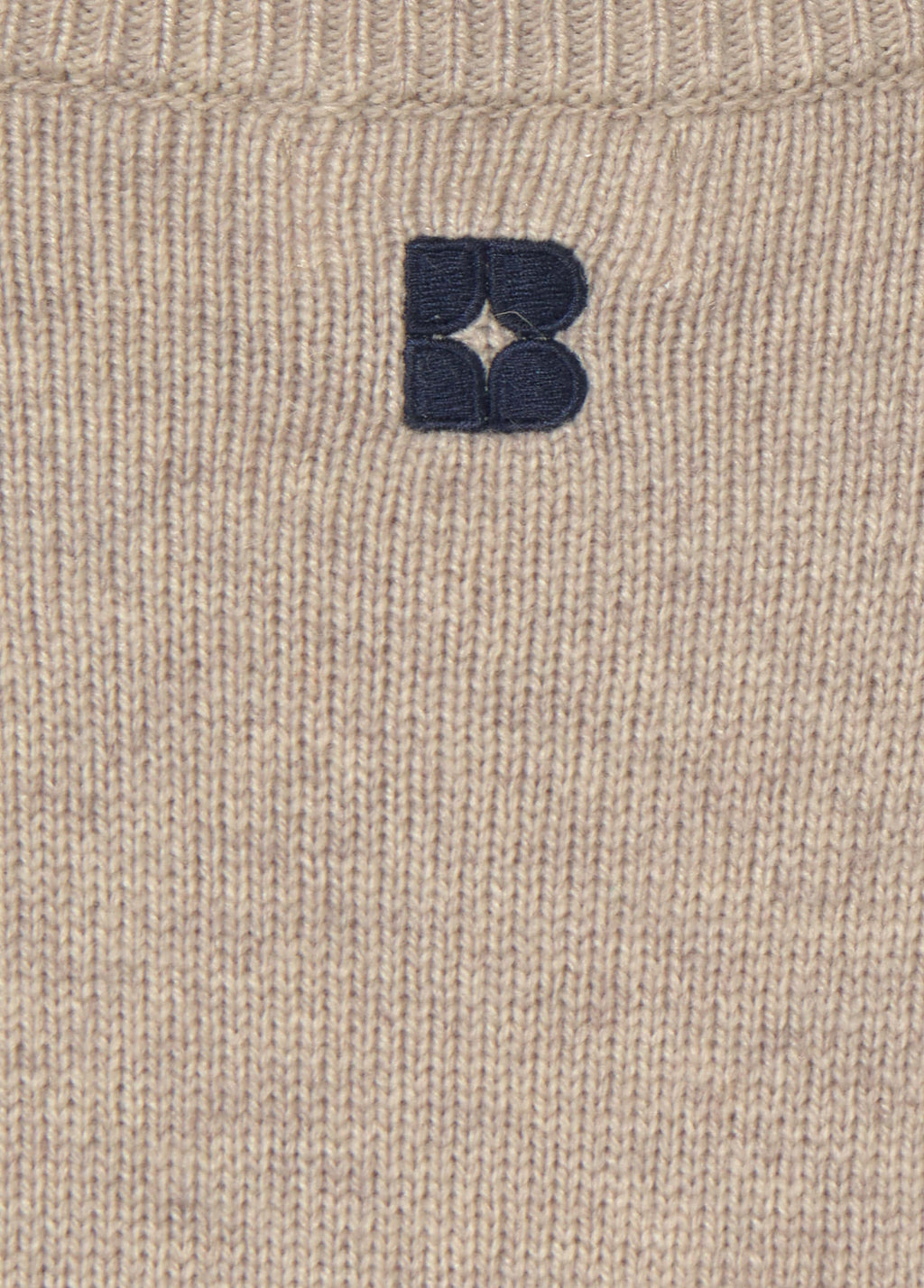Bow braid sweater
