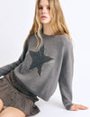 Trui met sterren en studs