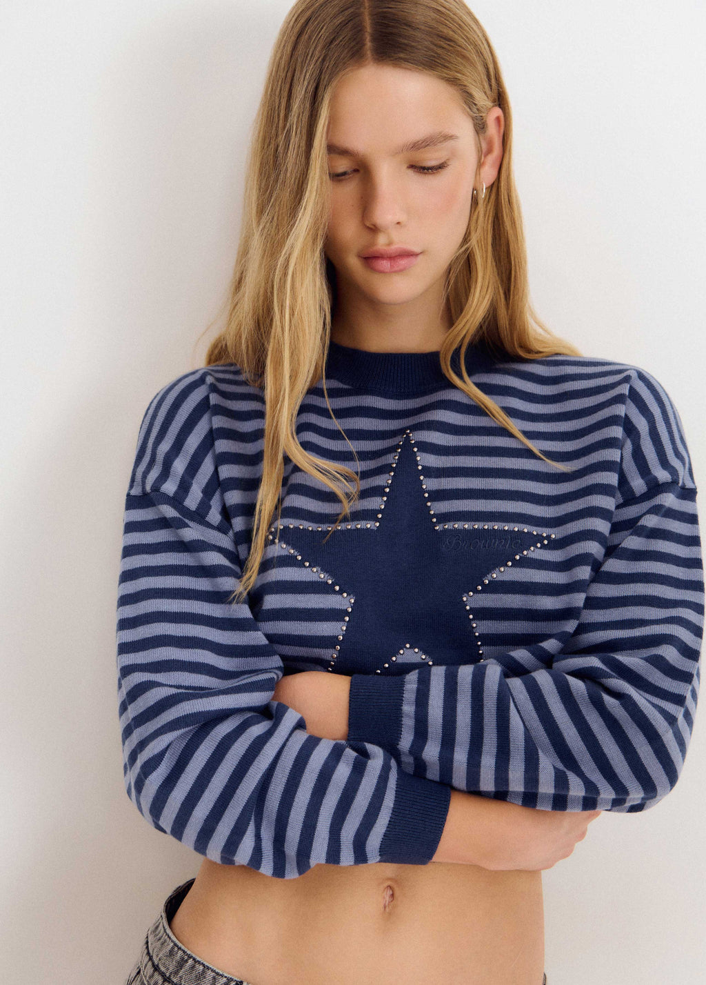 Maglione a righe con stella