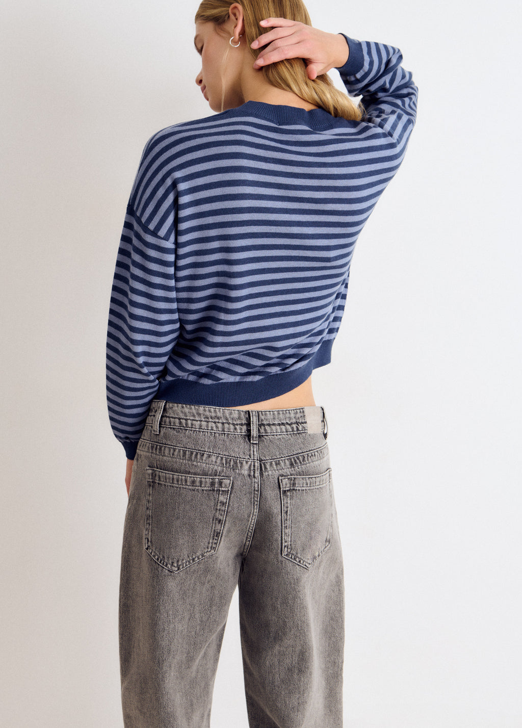 Maglione a righe con stella