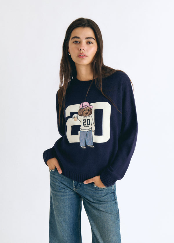 Jersey marino de punto con un diseño gráfico de un perrito y el número 20